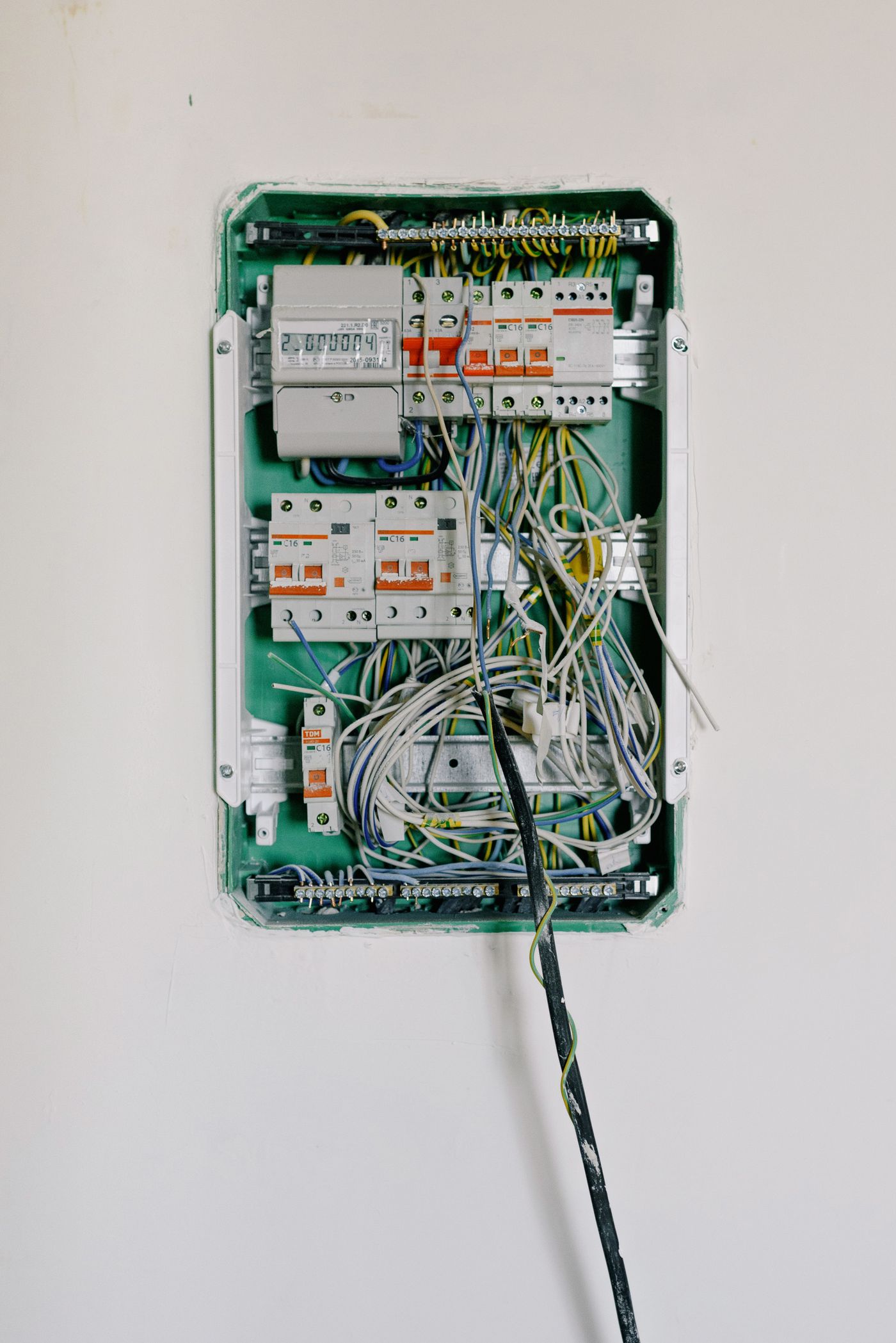 A panel rough-in with conductors landed