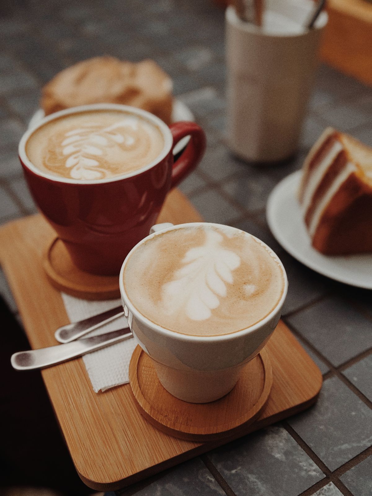 Latte-art cups on a board