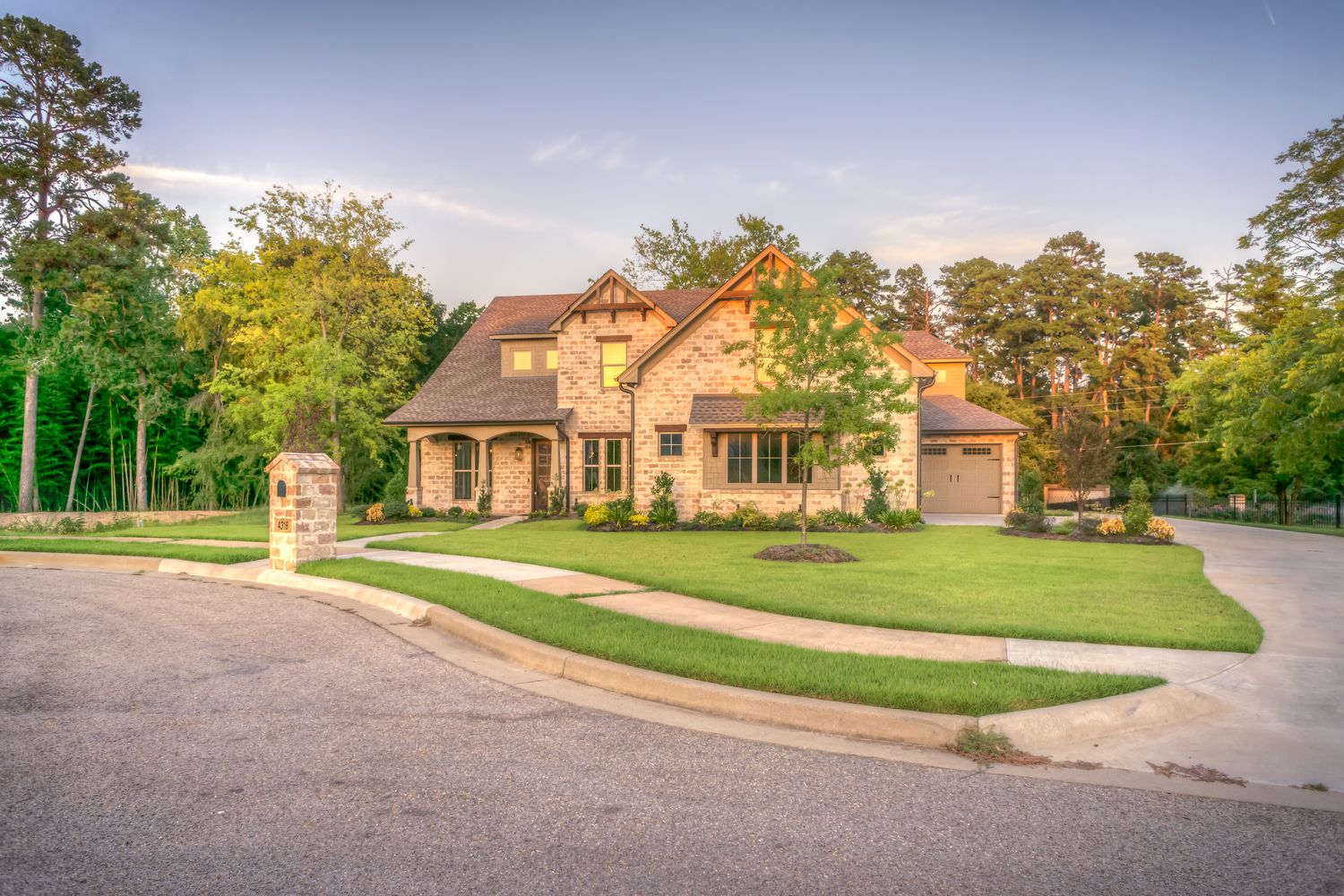 Large brick home with a finished roof
