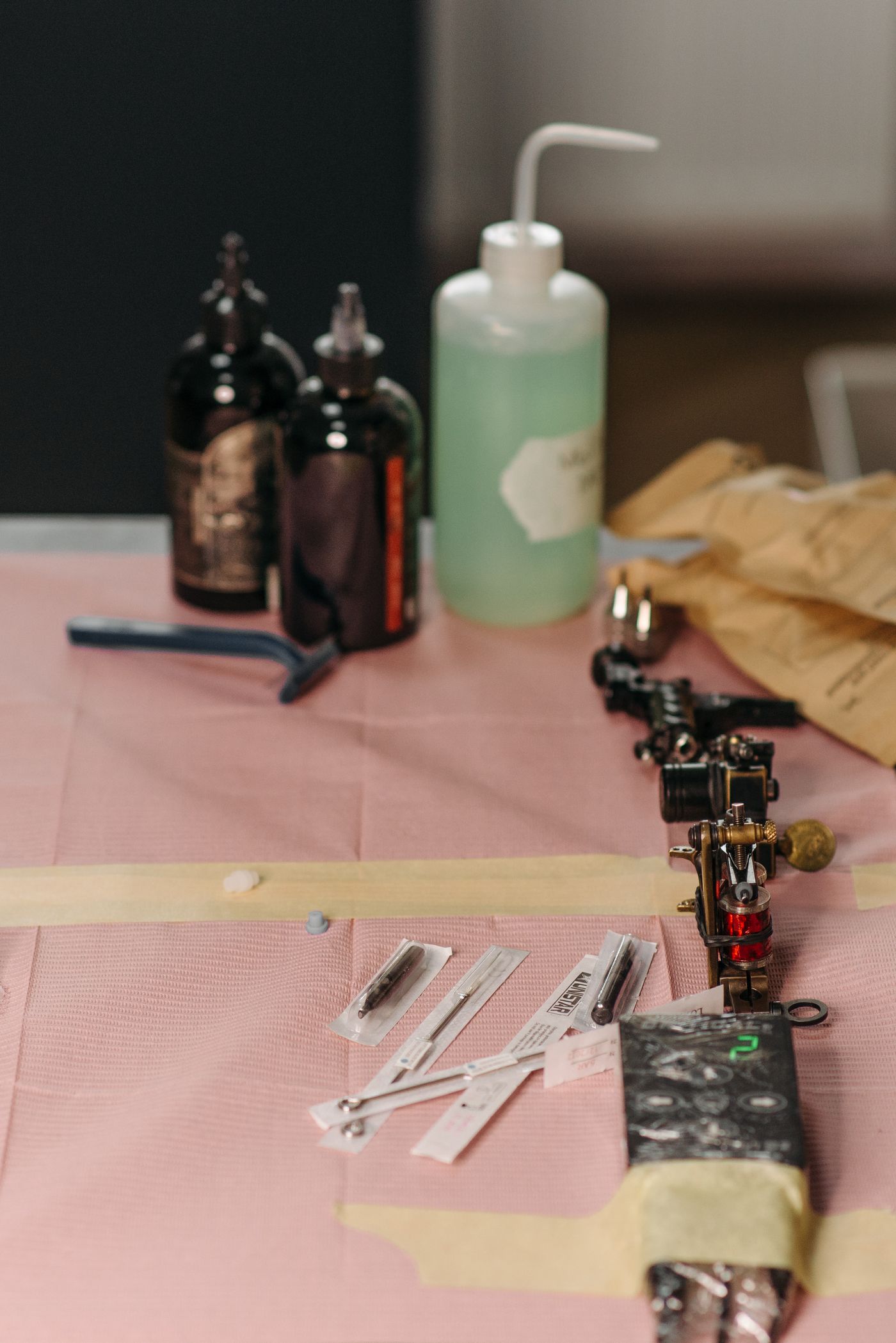 Tattoo supplies laid out on the table