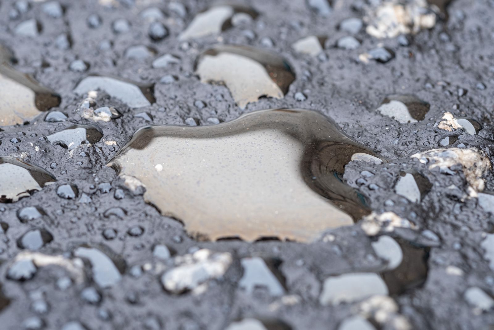 Wet sealed asphalt surface