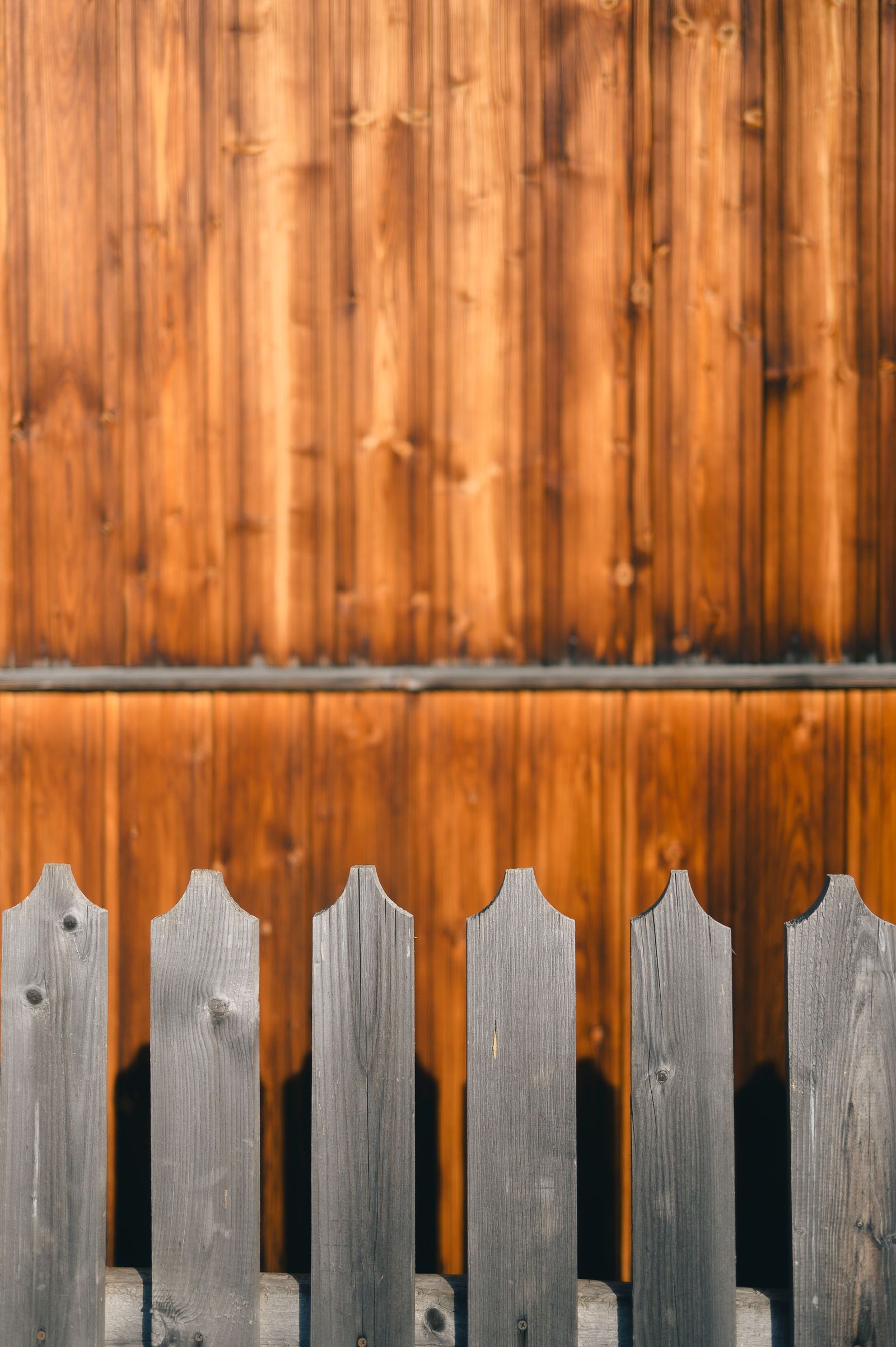 Cedar fence boards weathered to grey