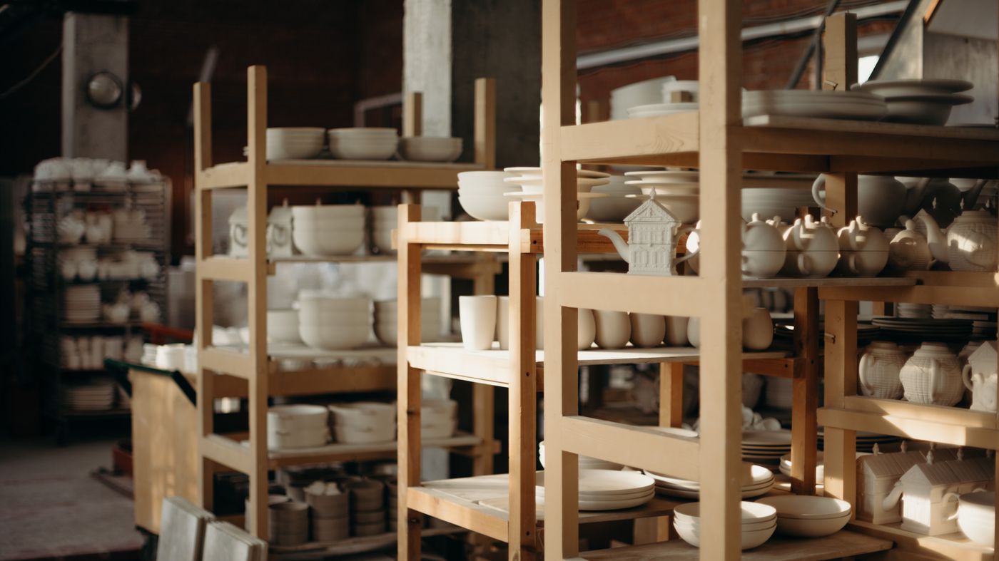 Shelves of handmade cups and teapots