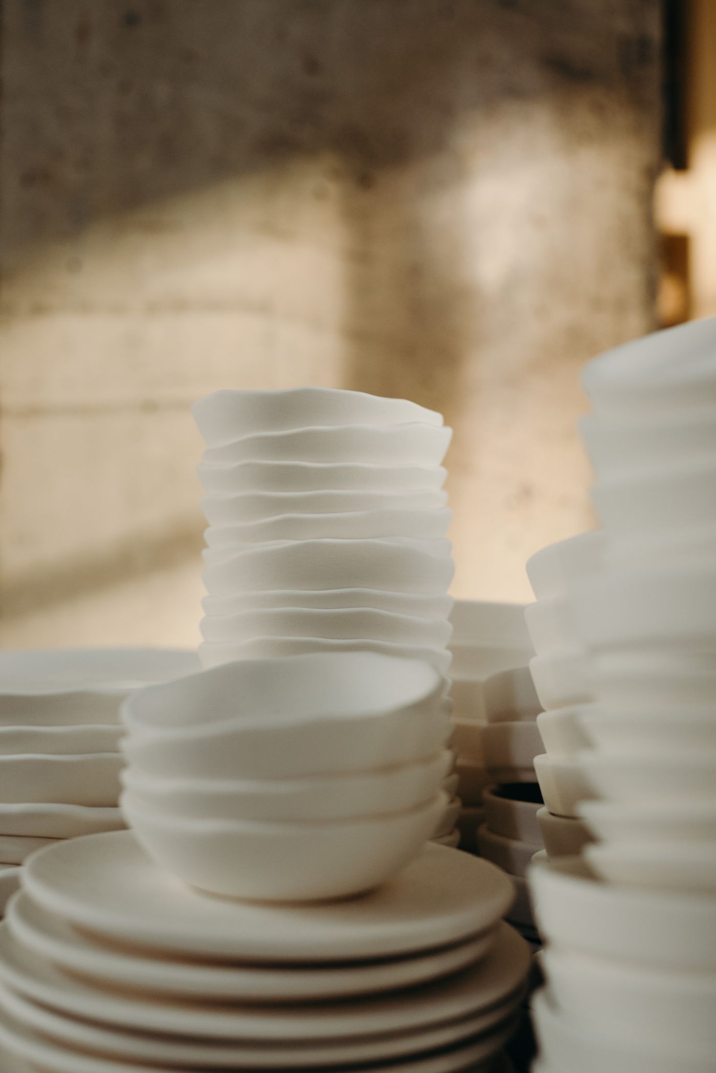 Stacked white ceramic pieces