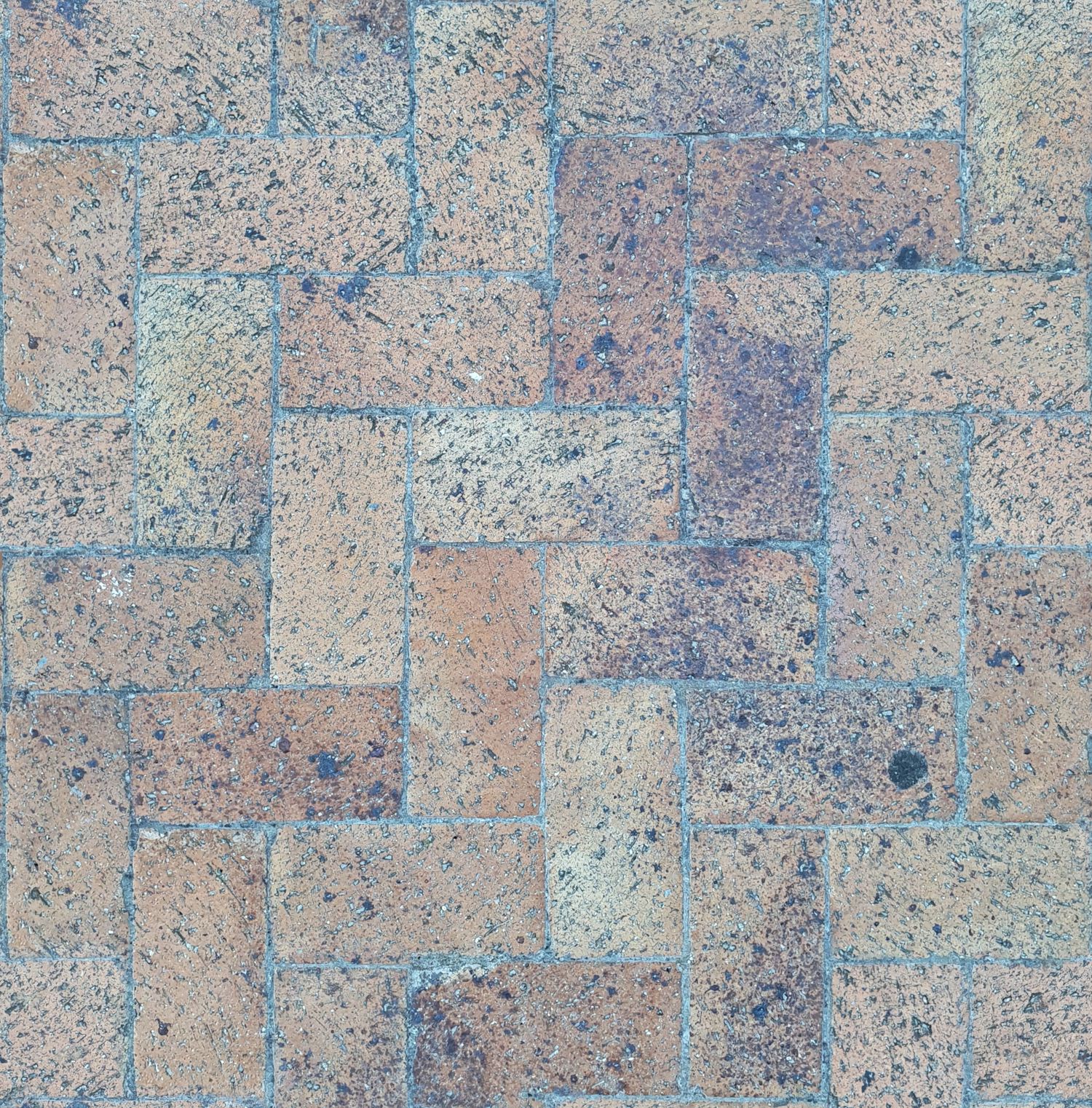 A herringbone paver field
