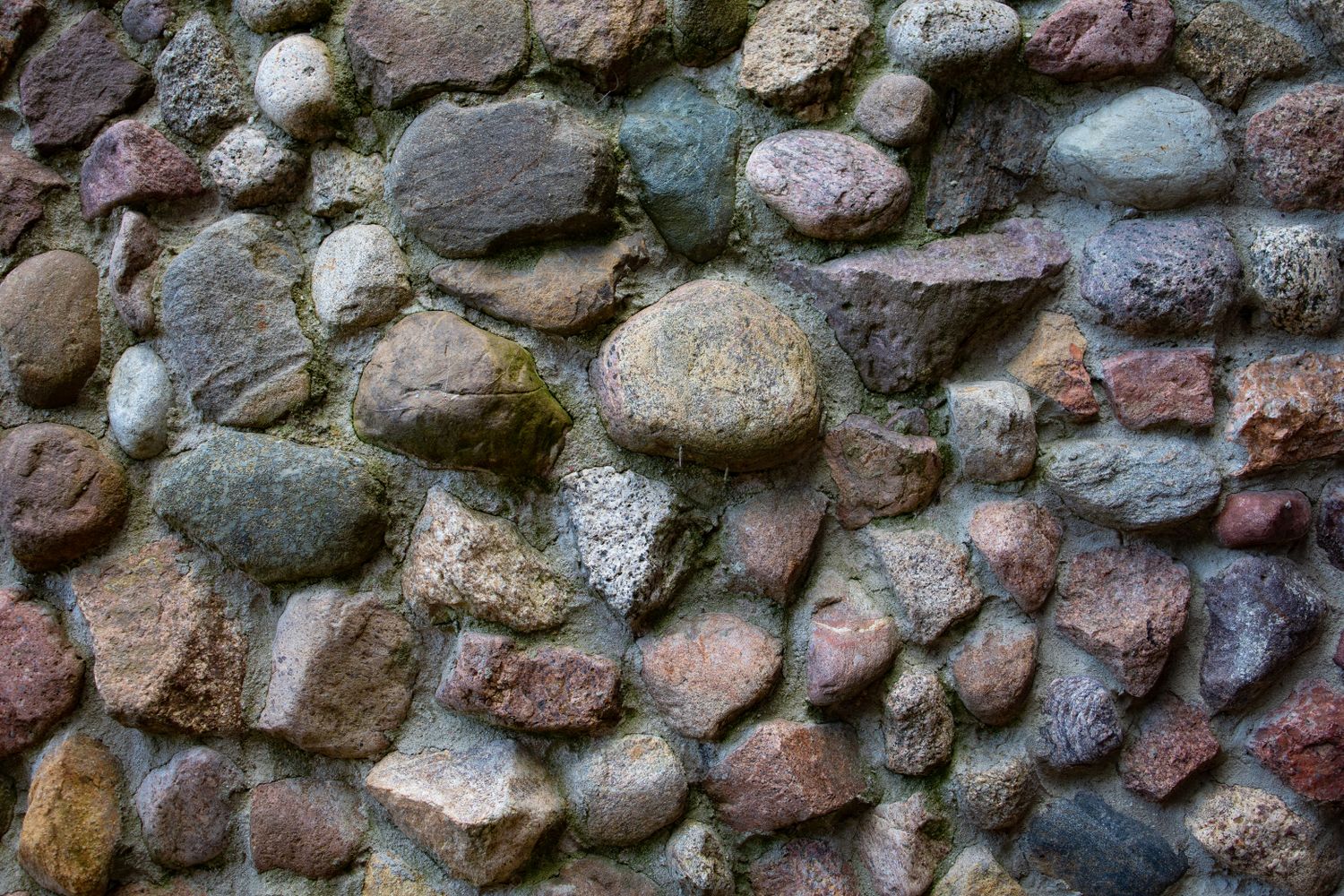 A stacked natural-stone retaining wall