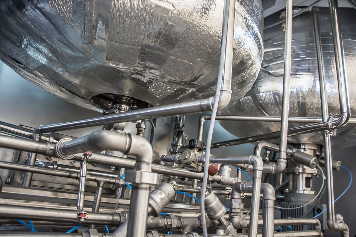 Insulated boiler tank and steel heating pipework