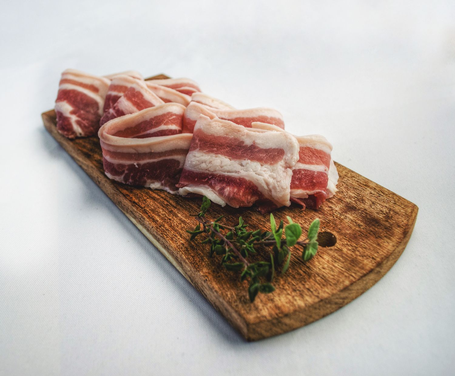 House-cured pancetta on a board