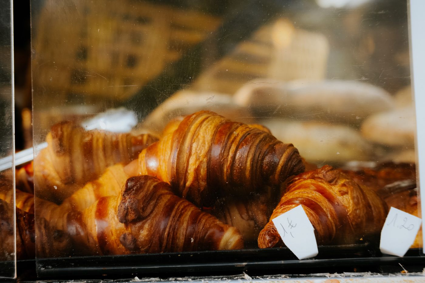 Croissants in a bakery display case