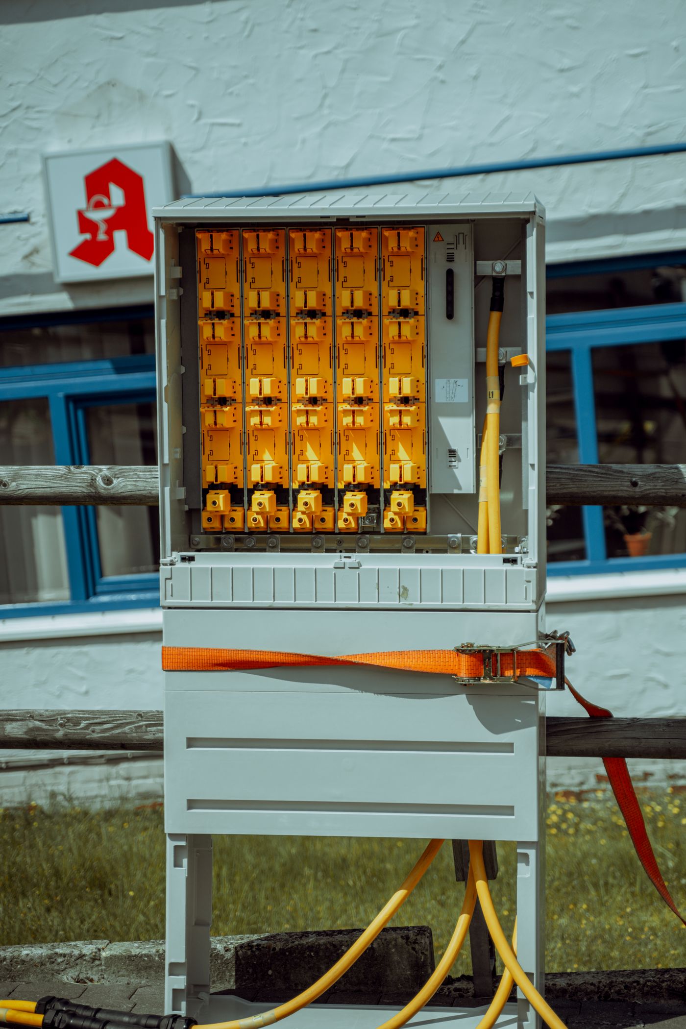 Yellow industrial control relays in a panel