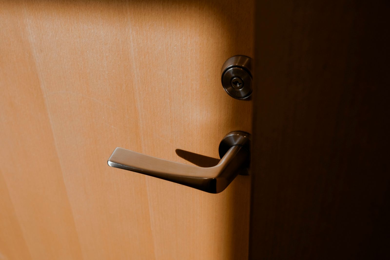A silver lever handle and lock