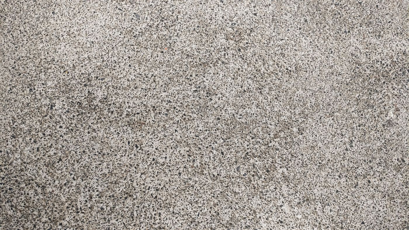 Close detail of a speckled flake epoxy coating