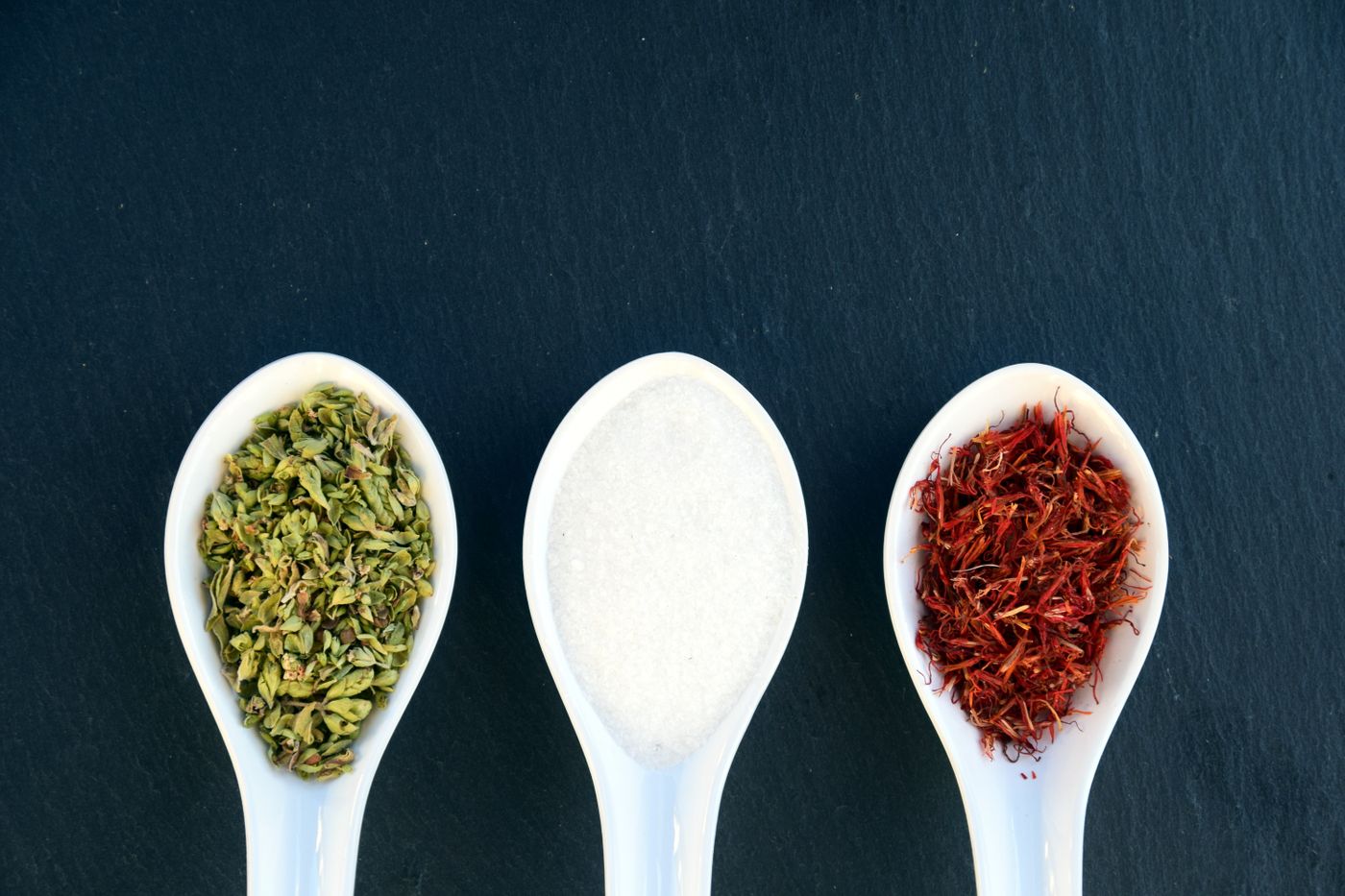 Three spoons of seeds and ground spices