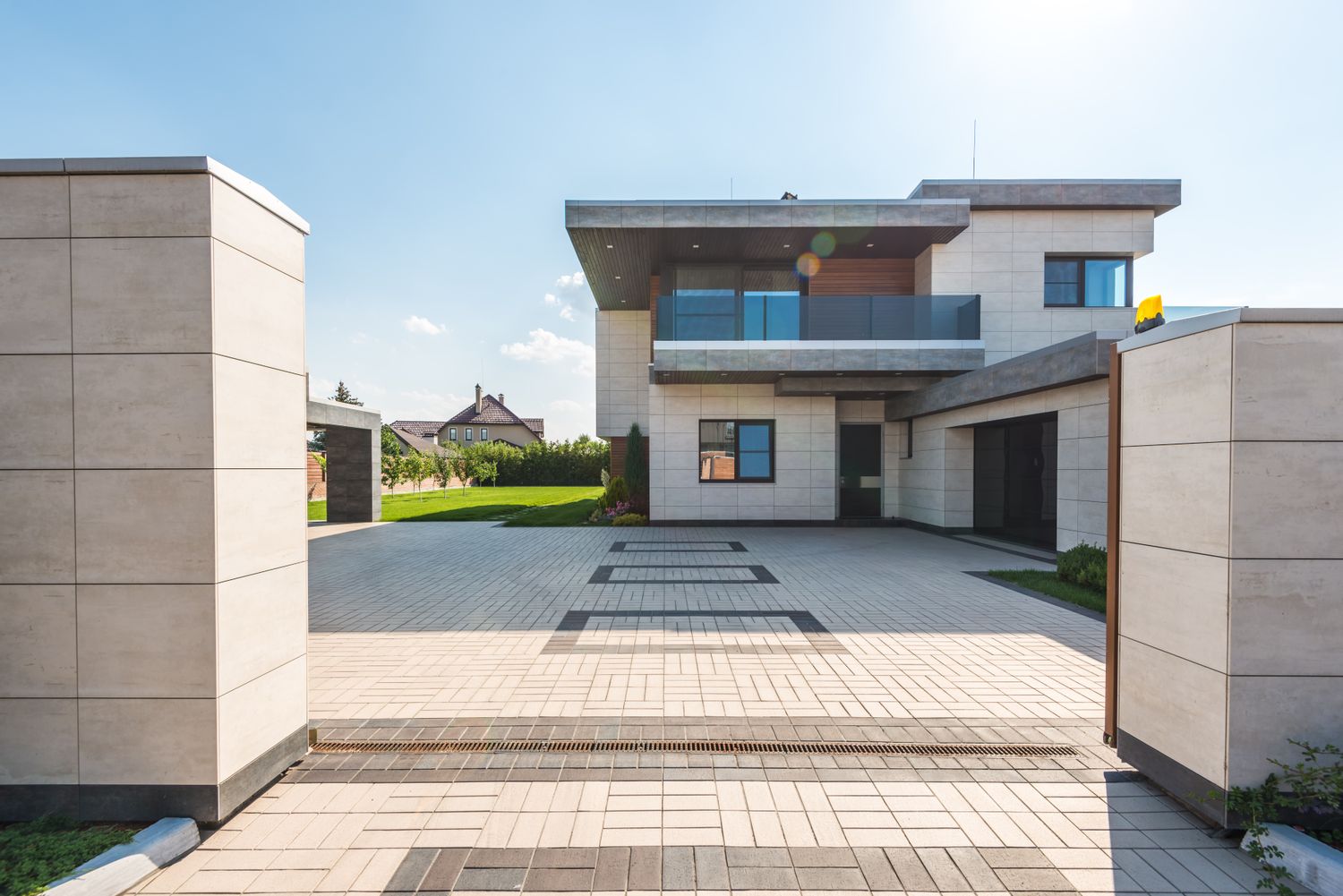 An automatic driveway gate at a modern home
