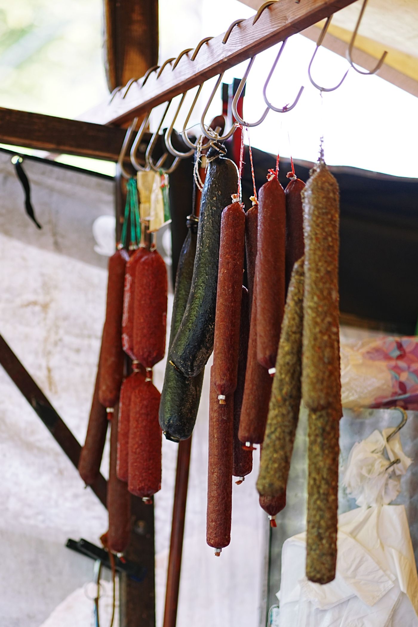 House sausages curing on the rack