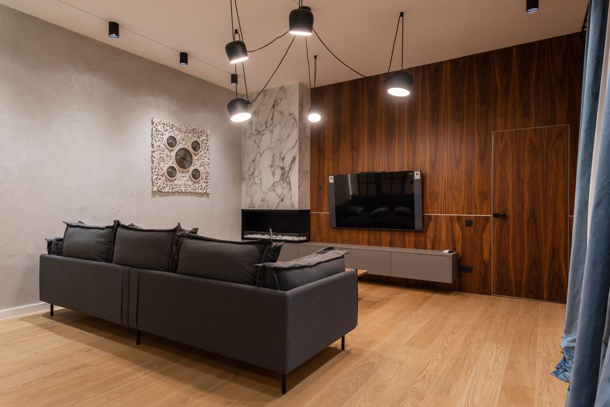 A fully restored living room with new walls and flooring