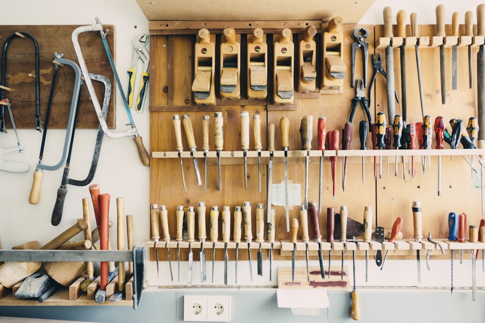 Woodworking and flooring tools on a wall