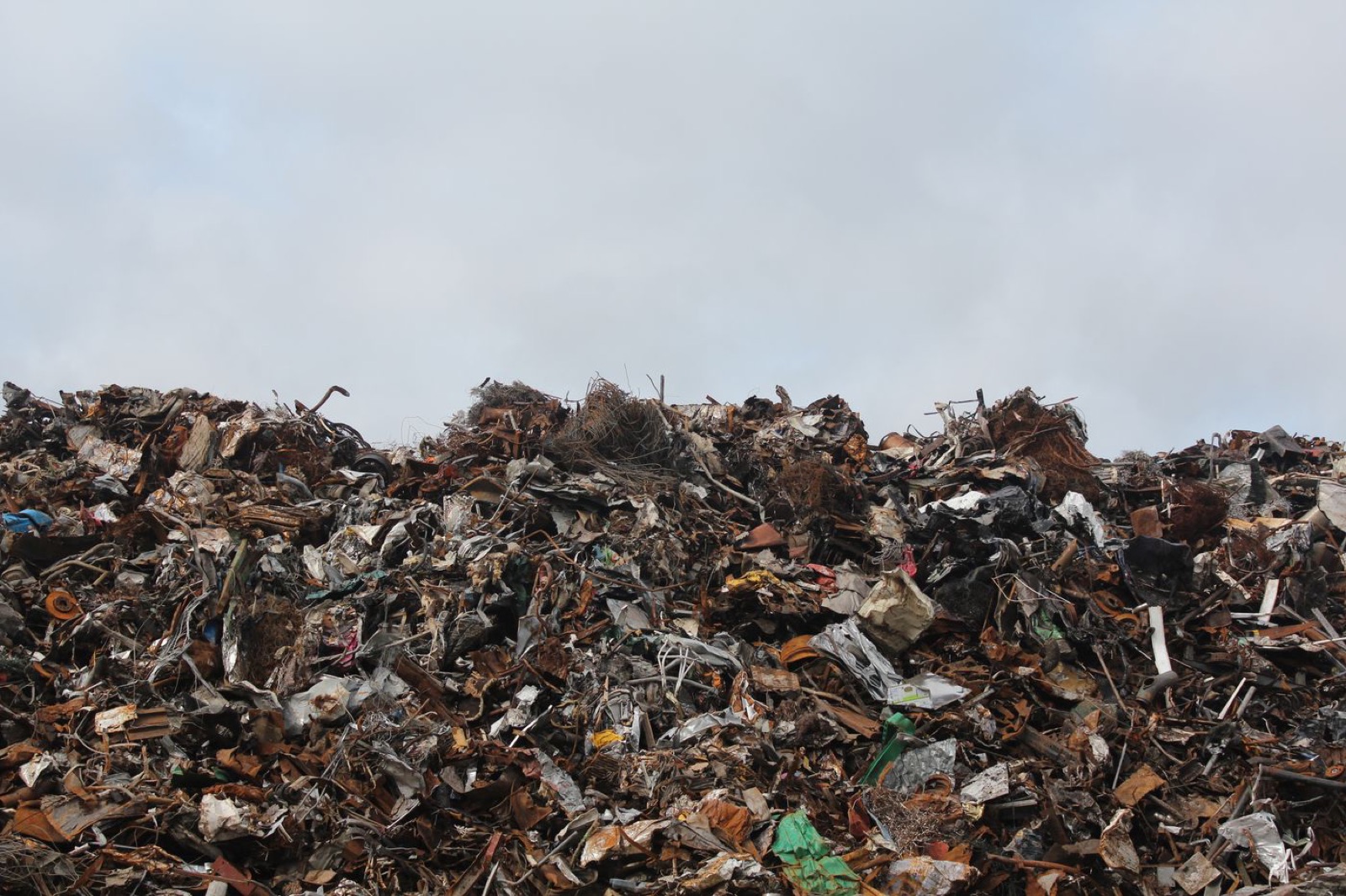 Large pile of mixed scrap and debris ready for removal