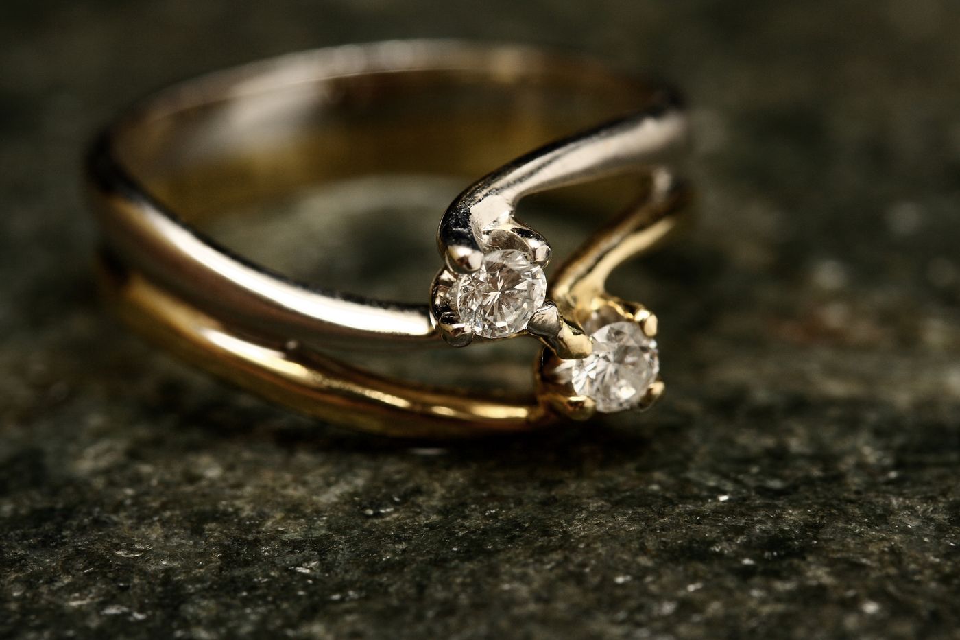 A handmade two-stone gold and diamond ring