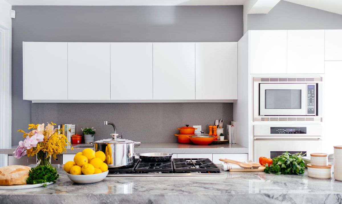 A built-in wall oven, microwave and cooktop