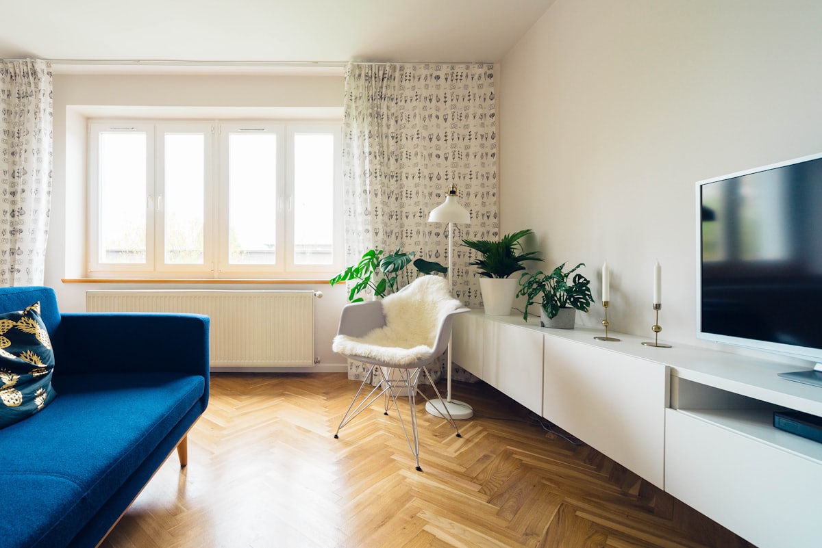 A living room dressed with soft coverings