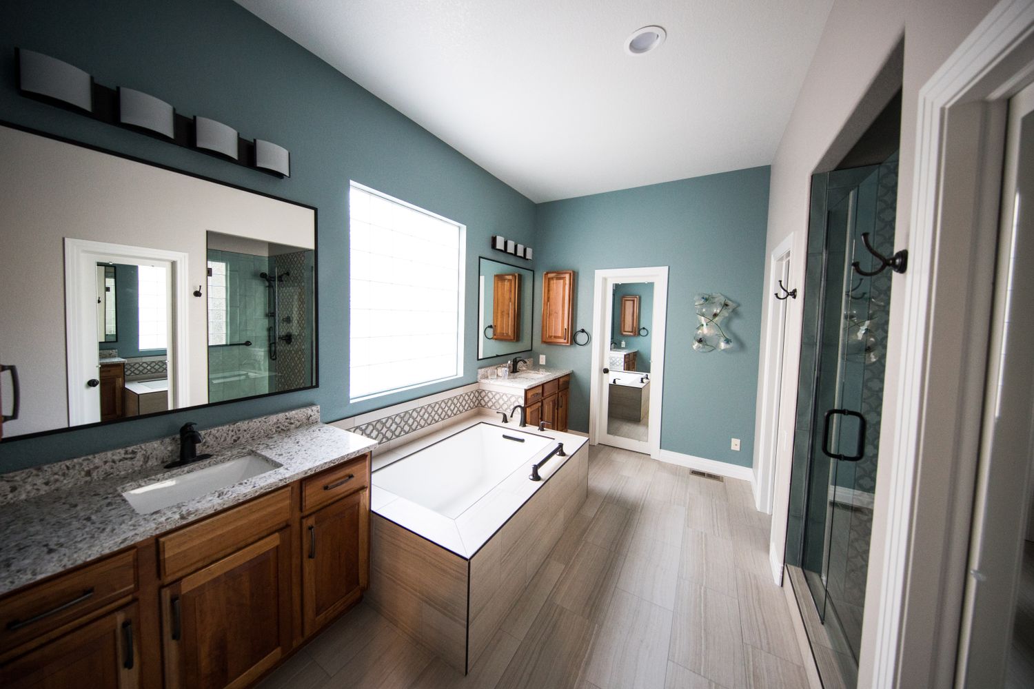 Renovated bathroom with tile and vanity