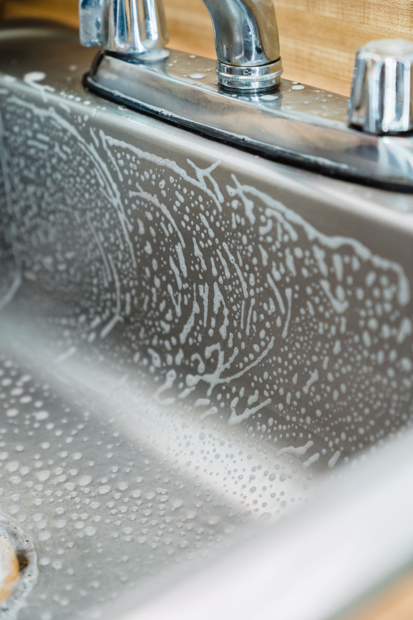 Water running clean from a new chrome tap