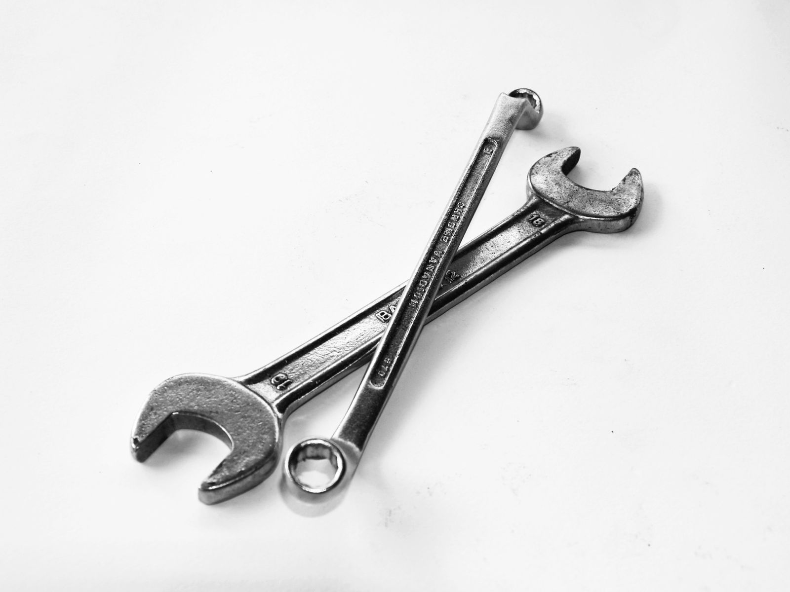A pair of combination wrenches