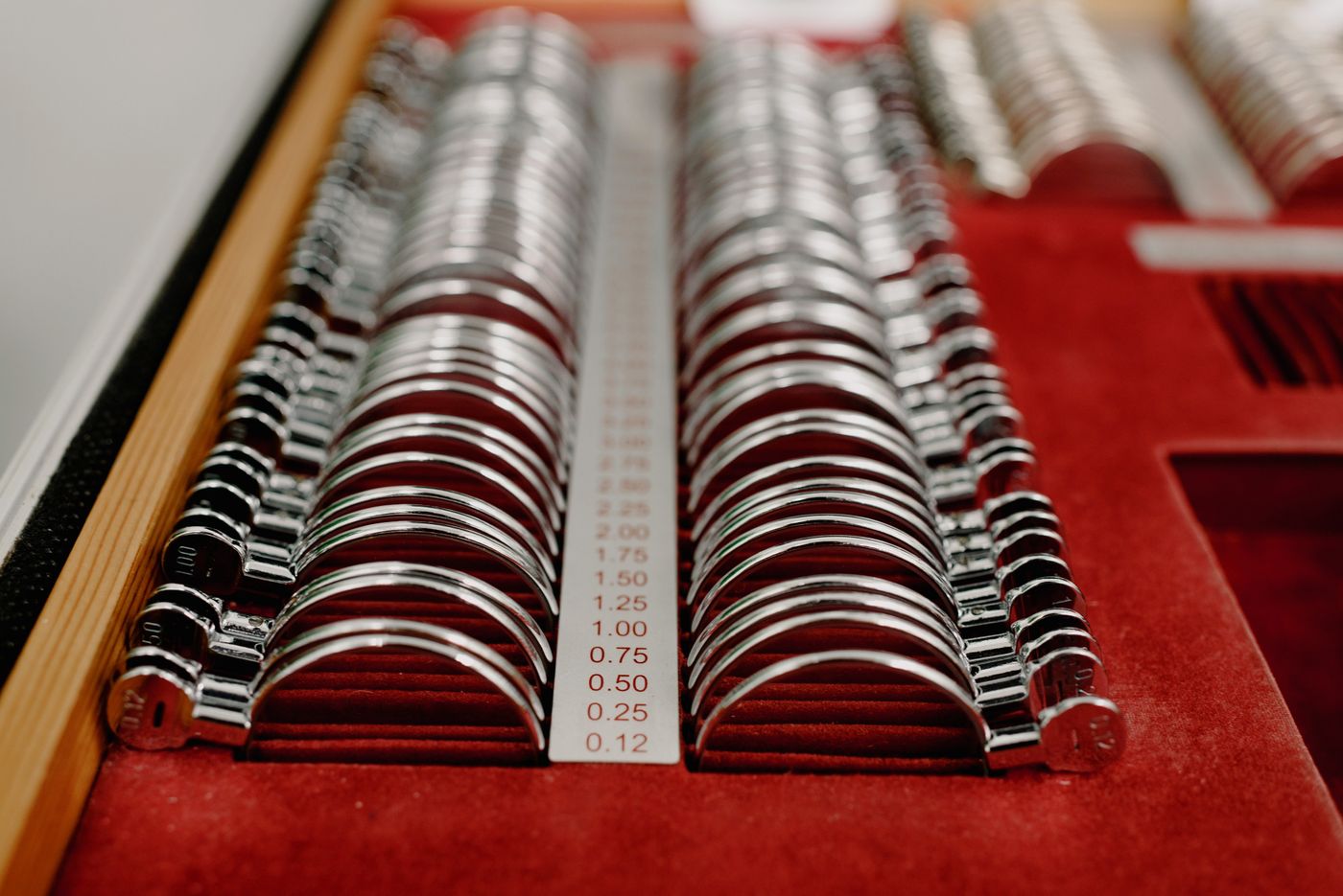 A set of trial lenses on red velvet
