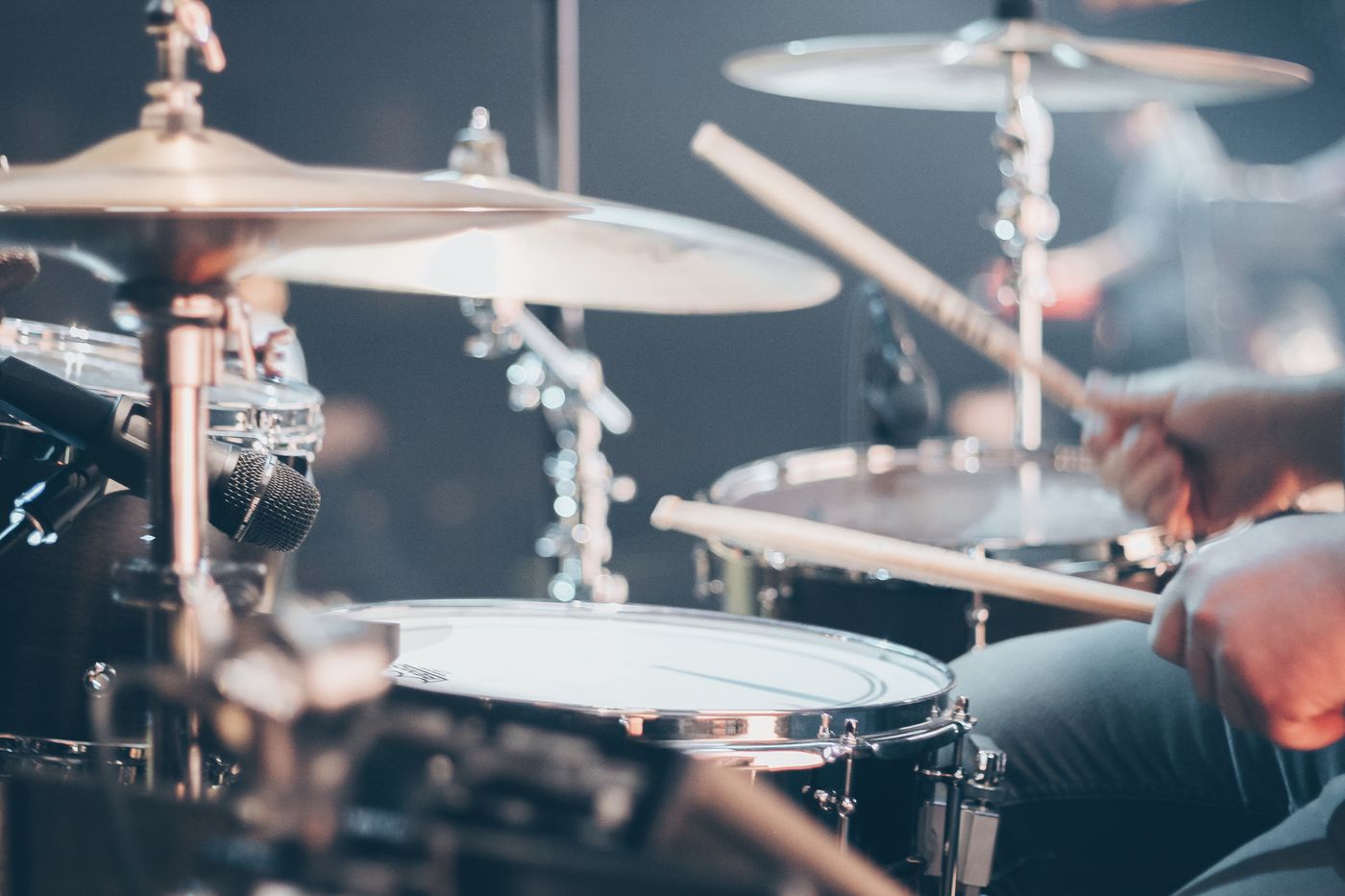 A drum kit set up on a small stage
