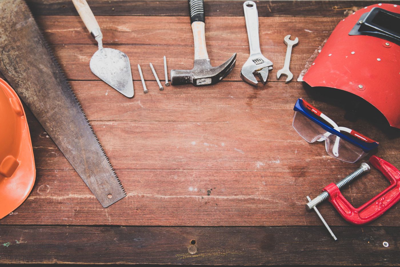Tools and accessories on a wooden bench
