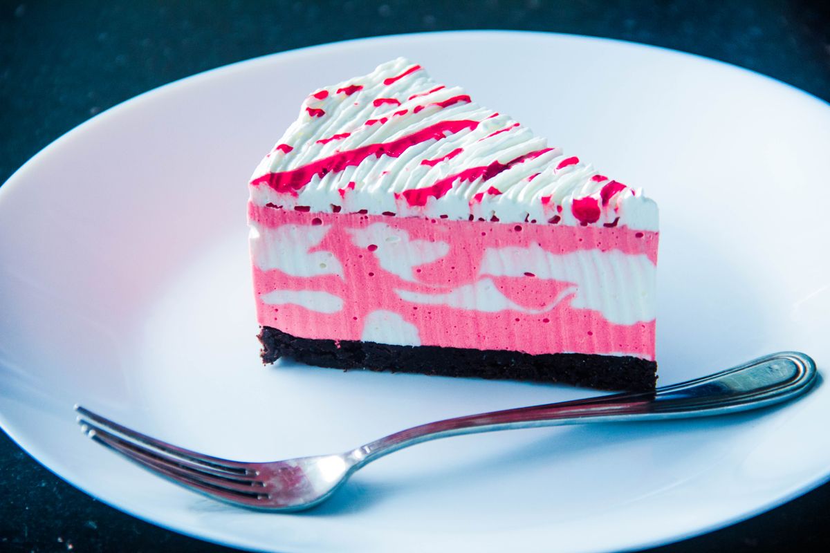 Berry-topped cheesecake slice