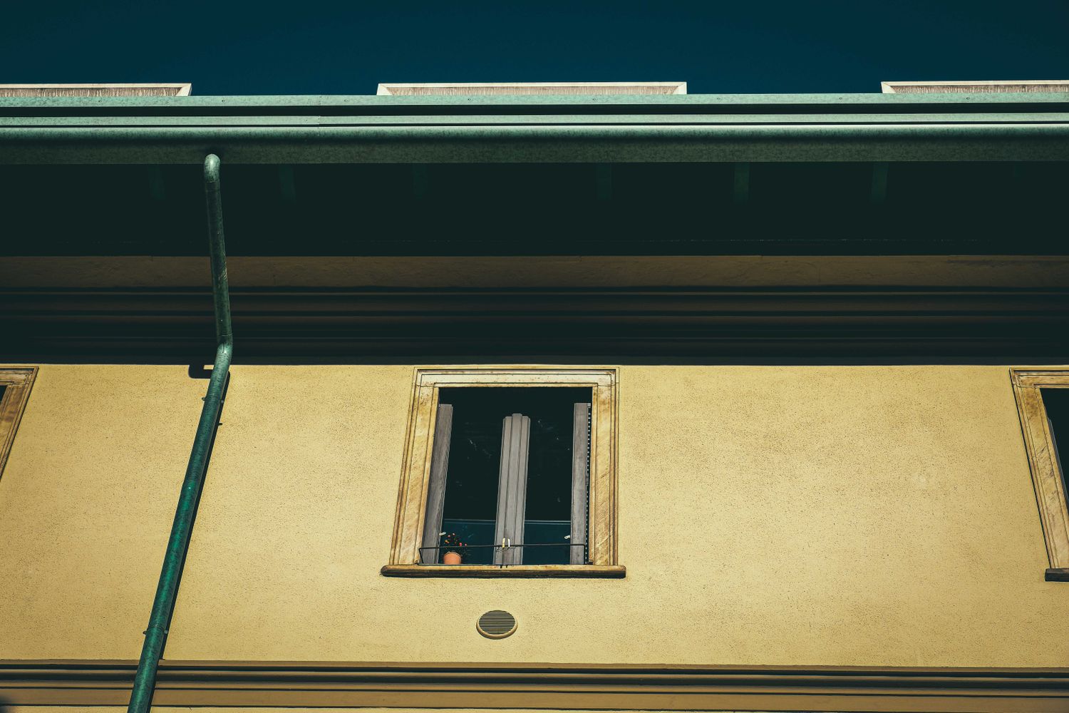 Eaves and downpipe detail