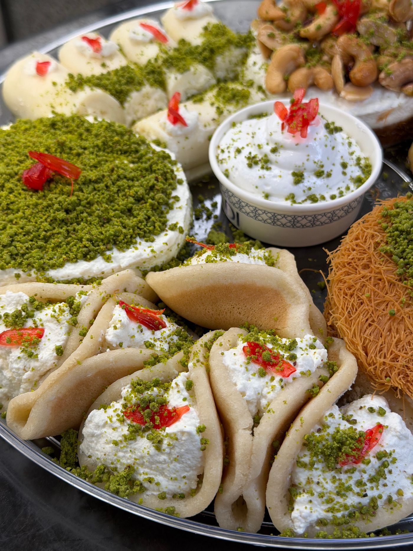 Tray of Persian pastries with pistachio and cream