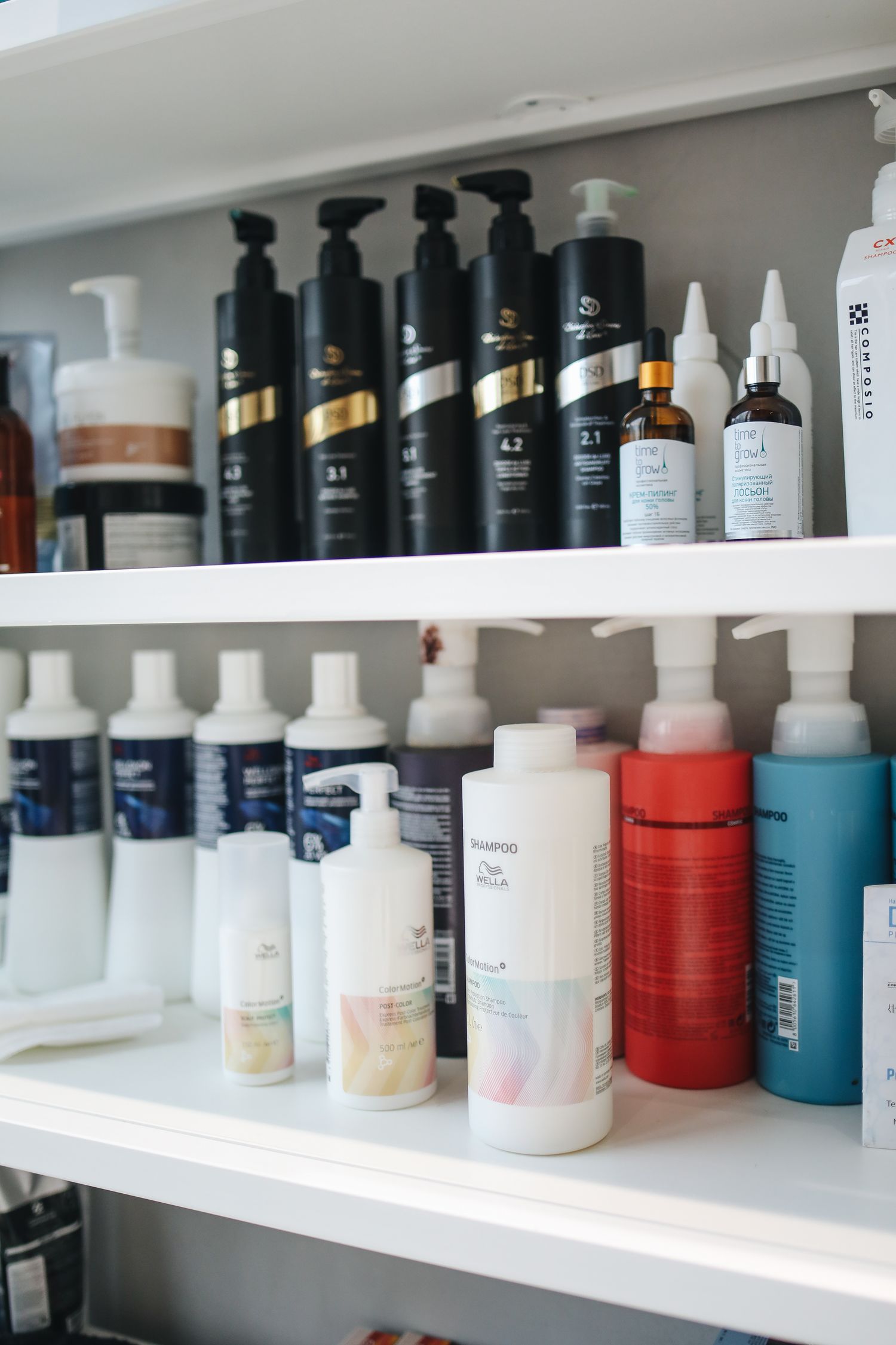 Shelf of medical-grade skincare bottles