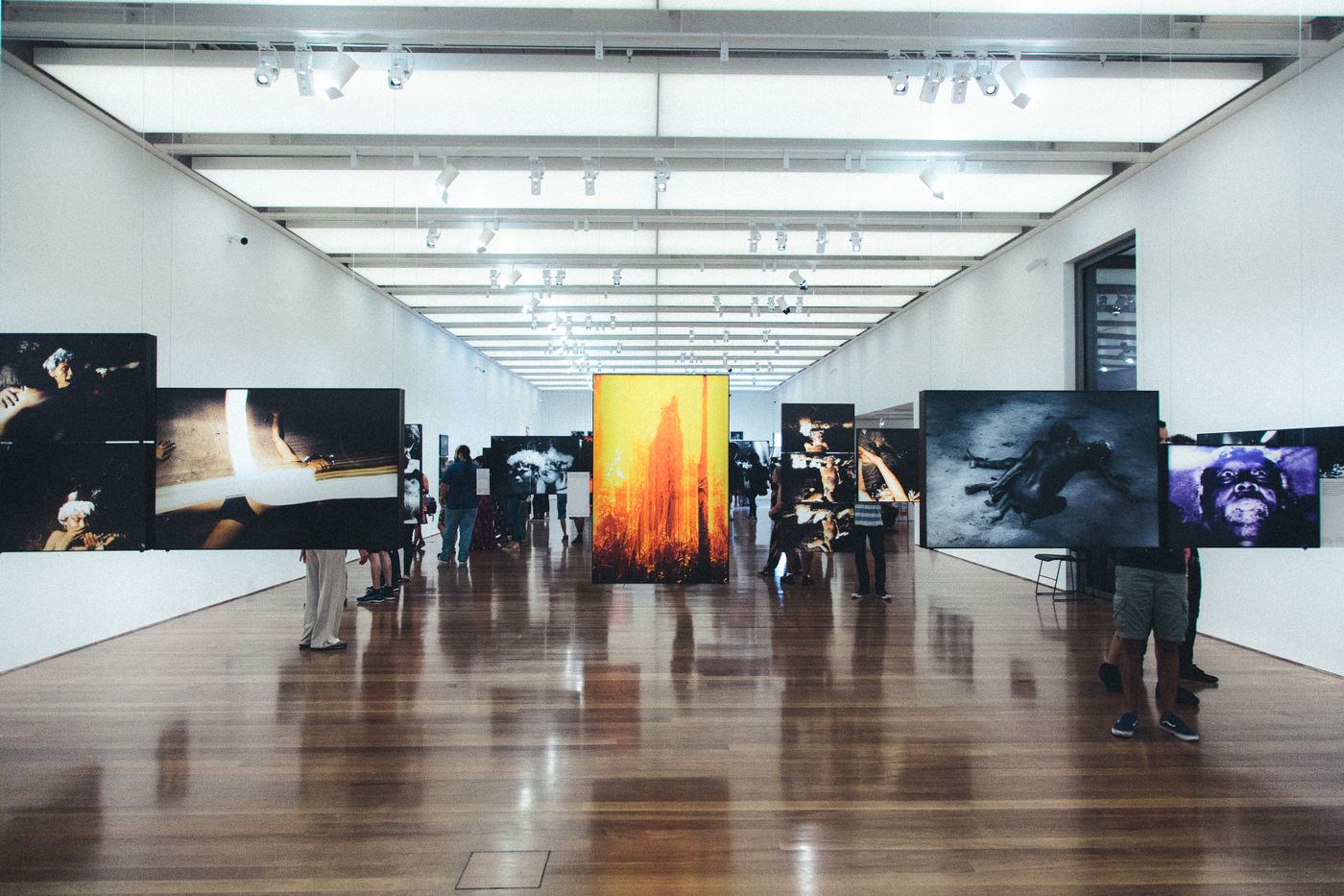 A gallery wall hung with framed art
