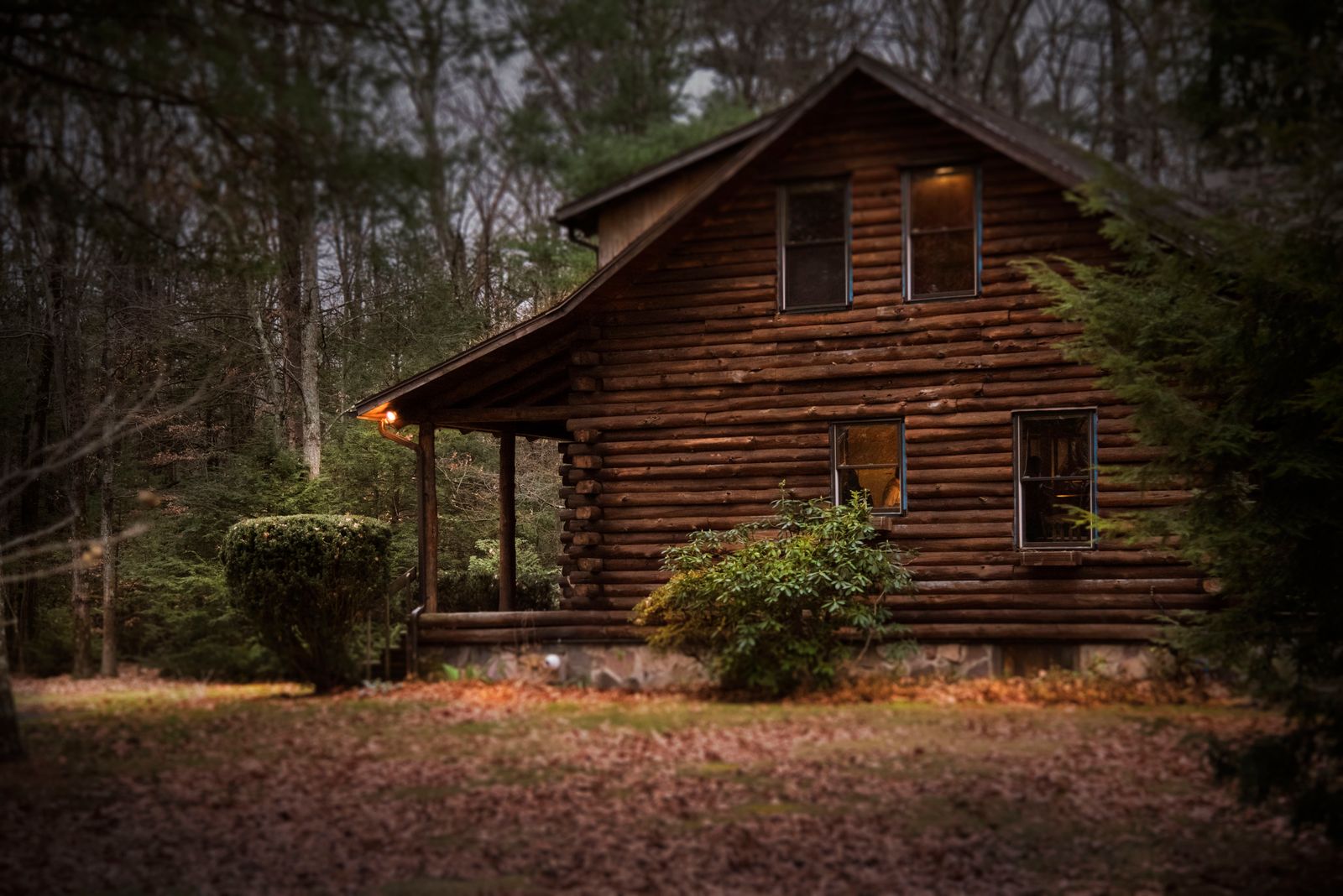 Home with a steep grey shingle roof