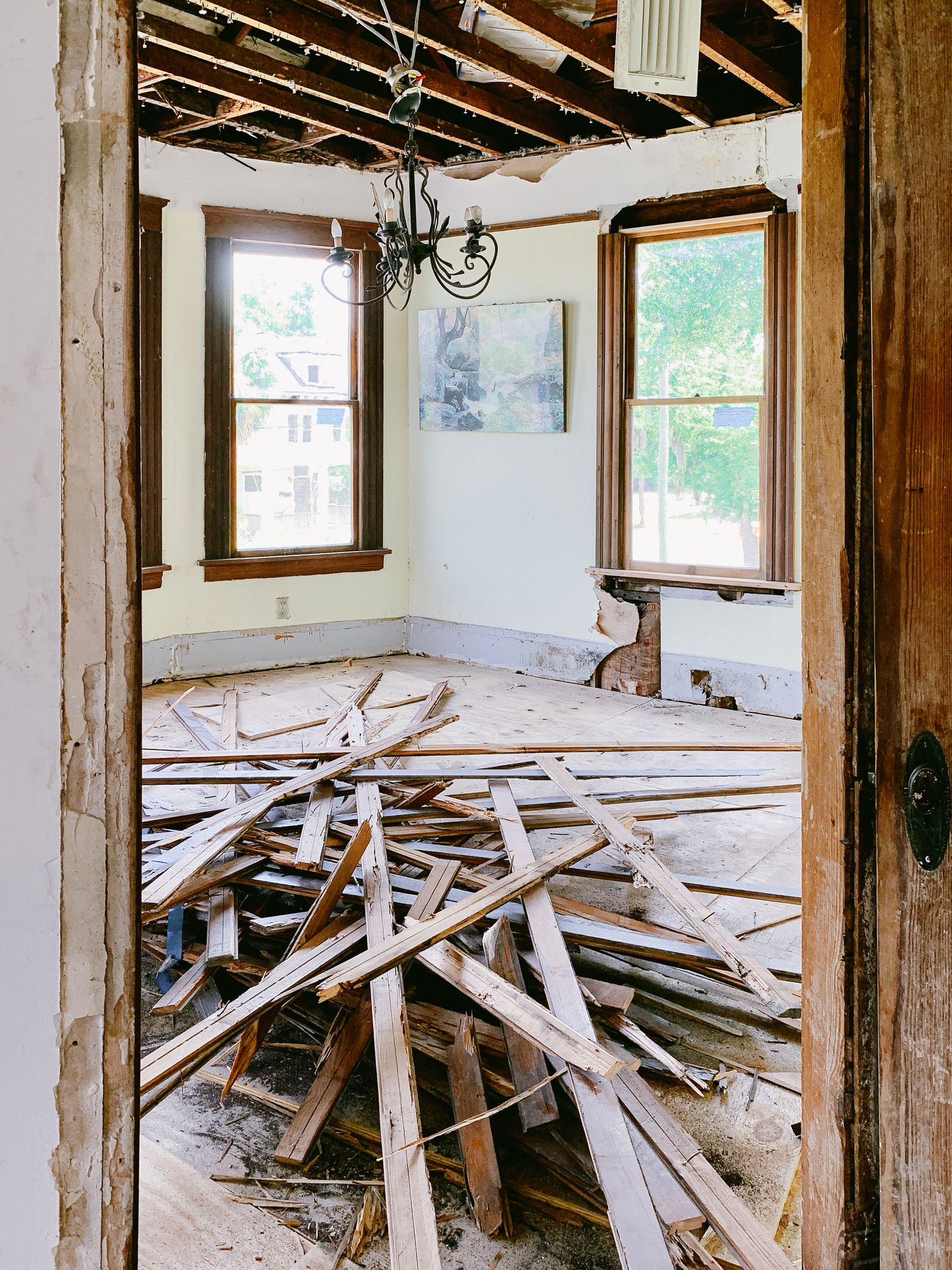 Room mid-teardown with debris