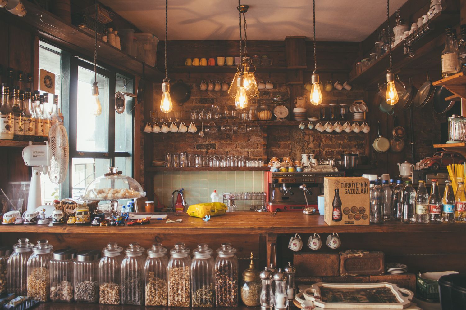 The warm interior of the shop with shelves of jars