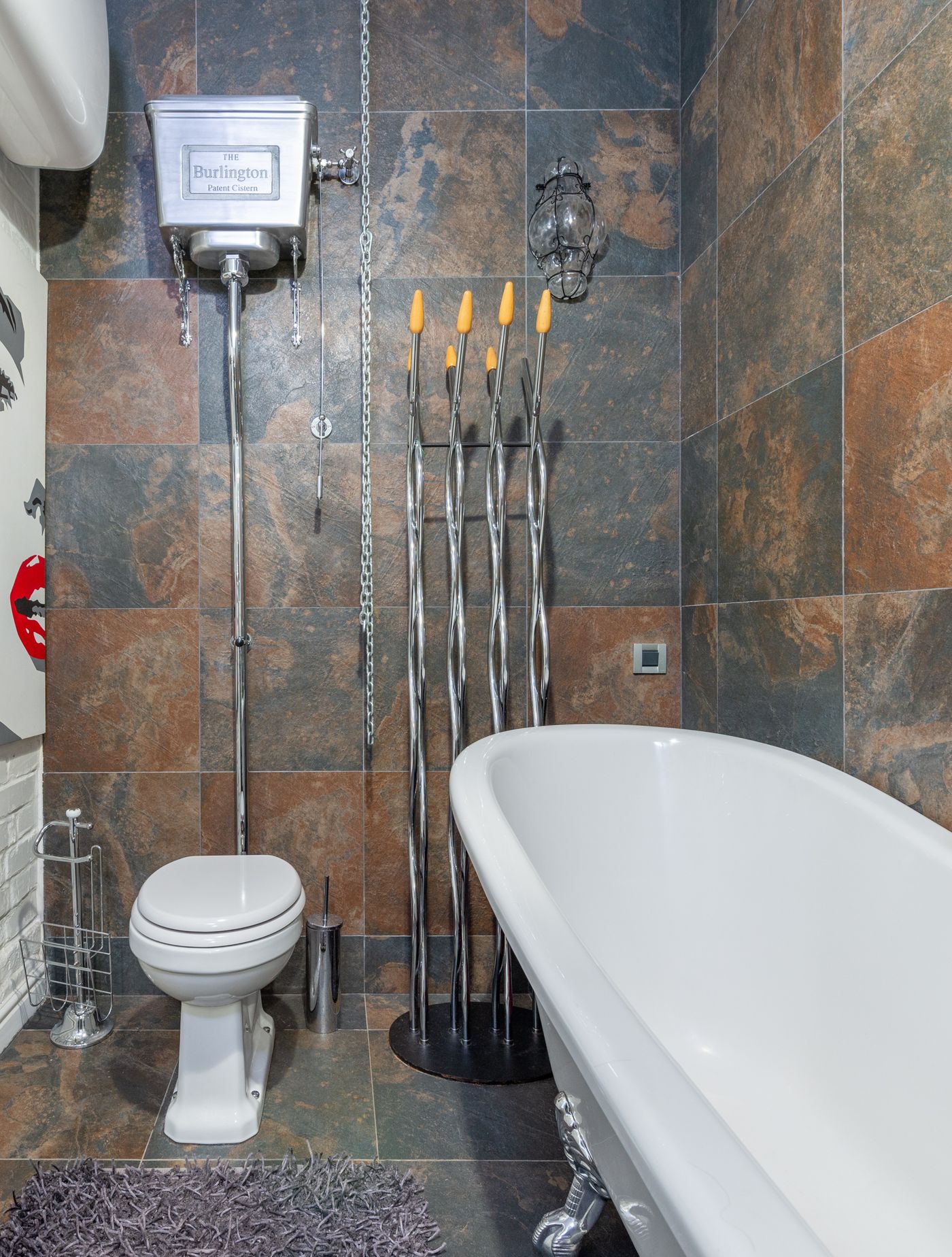 Clean white bathtub in a finished bathroom
